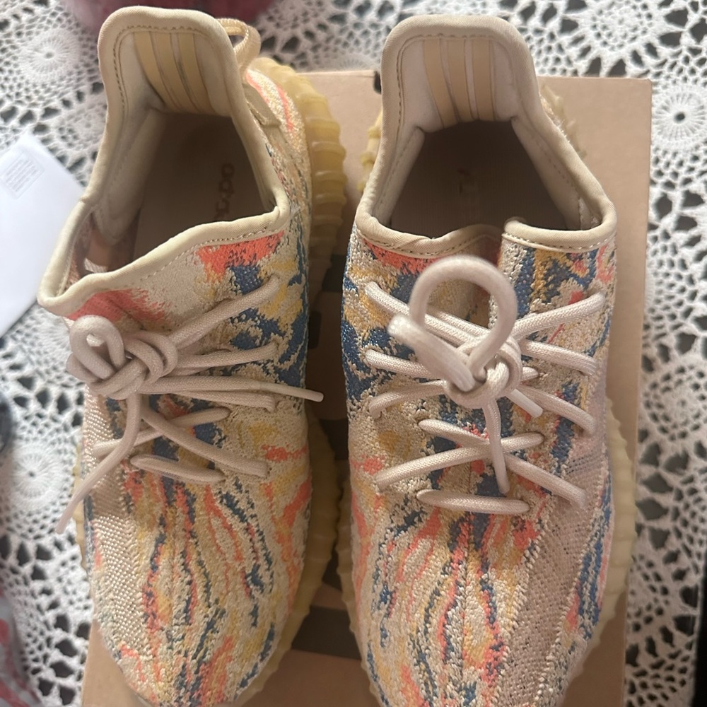 Yeezy Cream and Blue Sneakers with Lace-Up Design